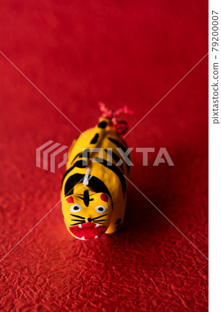 2022 Tiger year, cute tiger with a swinging papier mache 2022 Tiger year, cute tiger with a swinging papier mache 79200007