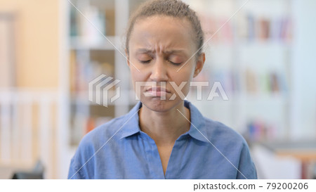 Portrait of Sad African Woman Crying at Camera Portrait of Sad African Woman Crying at Camera 79200206
