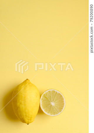 Fresh lemon on yellow color background Fresh lemon on yellow color background 79200890