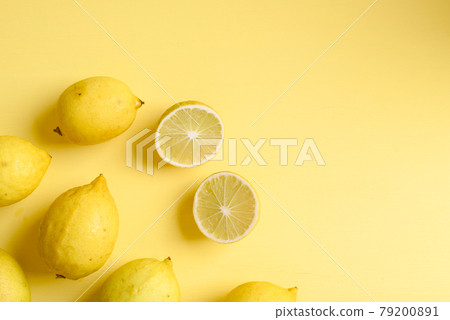 Fresh lemon on yellow color background, Flat lay, Top view Fresh lemon on yellow color background, Flat lay, Top view 79200891
