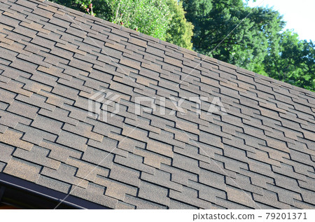 Modern roofing and decoration of chimneys. Flexible bitumen or slate shingles Modern roofing and decoration of chimneys. Flexible bitumen or slate shingles 79201371