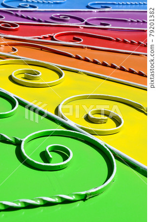 Metal texture of a piece of colored wall with a forged pattern Metal texture of a piece of colored wall with a forged pattern 79201382