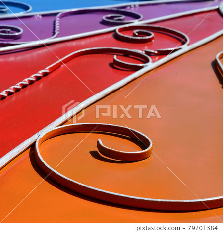 Metal texture of a piece of colored wall with a forged pattern 79201384