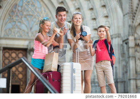 Tourist family taking photo of city Tourist family taking photo of city 79201668
