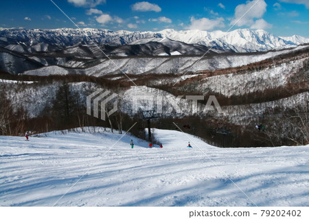 Tanigawadake mountain range in the midwinter season Tanigawadake and Ichinokurazawa distant view Superb view from Kawaba ski resort 79202402