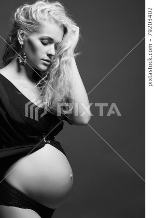young beautiful pregnant woman. Blonde girl with big belly 79203402