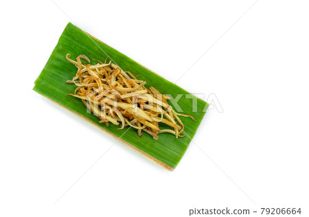 Top view fresh sliced finger roots in nature tray of banana leaf and banana tree, image freshly sliced finger roots in nature tray on white background. Top view fresh sliced finger roots in nature tray of banana leaf and banana tree, image freshly sliced finger roots in nature tray on white background. 79206664