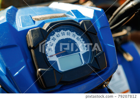 Close-up details of cross motorcycle parked on ground 79207812