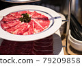 Raw beef in Japanese restaurant. This restaurant specializes in grilled meat. 79209858