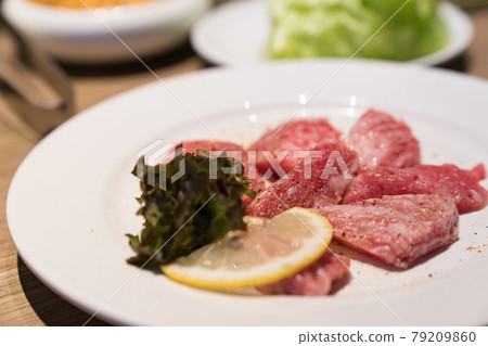Raw beef in Japanese restaurant. This restaurant specializes in grilled meat. 79209860