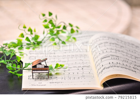 Image of piano and sheet music 79215815