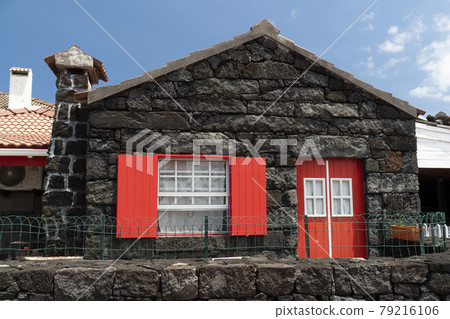 Lajido village Pico Island Azores black lava houses red windows Lajido village Pico Island Azores black lava houses red windows 79216106