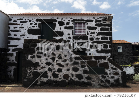 Lajido village Pico Island Azores black lava houses red windows Lajido village Pico Island Azores black lava houses red windows 79216107
