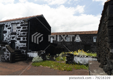 Lajido village Pico Island Azores black lava houses red windows 79216109
