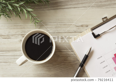 Coffee and materials on the desk Coffee and materials on the desk 79216411