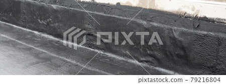 Waterproofing flat roof terrace with roll bitumen 79216804