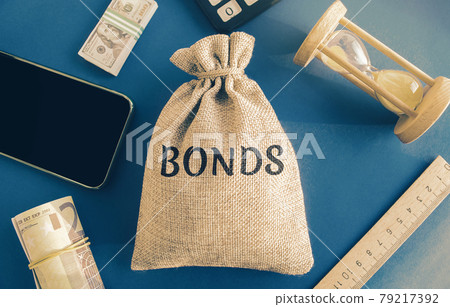 Money bag with the word Bonds. A bond is a security that indicates that the investor has provided a loan to the issuer. Equivalent loan. Unsecured and secured bonds. Money bag with the word Bonds. A bond is a security that indicates that the investor has provided a loan to the issuer. Equivalent loan. Unsecured and secured bonds. 79217392