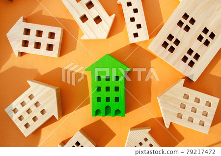 Many miniature wooden houses. Real estate concept. Choose affordable housing. Buying and selling housing. Market Analytics. Demand for housing. Rising and falling home prices. Population Many miniature wooden houses. Real estate concept. Choose affordable housing. Buying and selling housing. Market Analytics. Demand for housing. Rising and falling home prices. Population 79217472