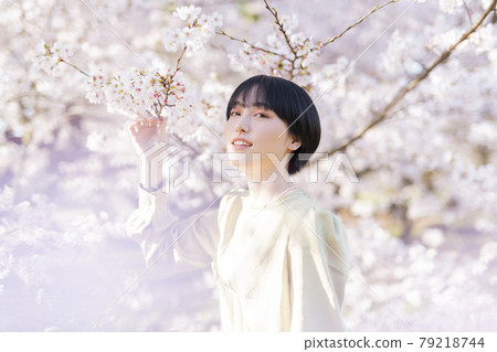 Cherry blossom and woman portrait Cherry blossom and woman portrait 79218744
