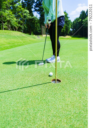 Golf green putting [image of outdoor sports] 79222011