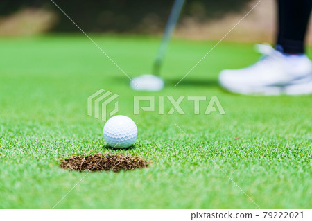 Golf green putting [image of outdoor sports] 79222021