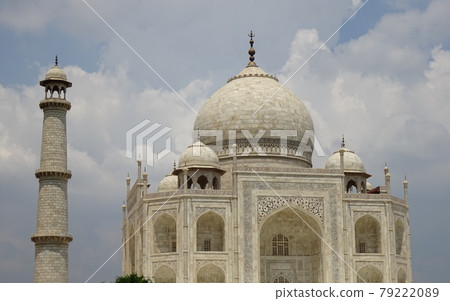 A close view of the Taj Mahal, the dome and the tower A close view of the Taj Mahal, the dome and the tower 79222089