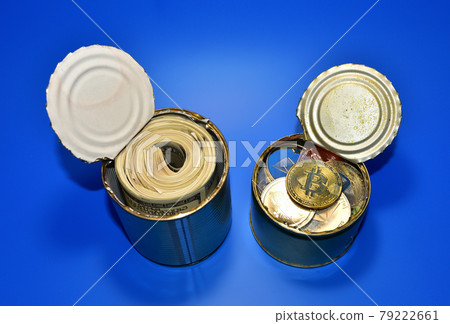 Bitcoin and dollars in tin can. Keeping money and cryptocurrency in metal food can. Bitcoin and dollars in tin can. Keeping money and cryptocurrency in metal food can. 79222661