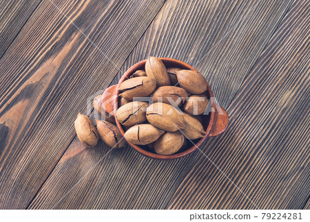 Bowl of pecans Bowl of pecans 79224281