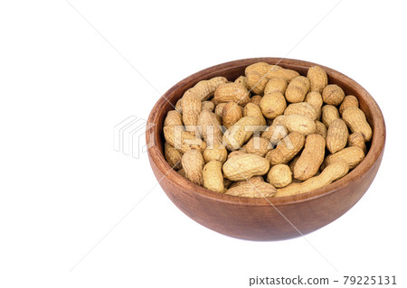 peanut in a shell texture. food background of peanuts peanut in a shell texture. food background of peanuts 79225131