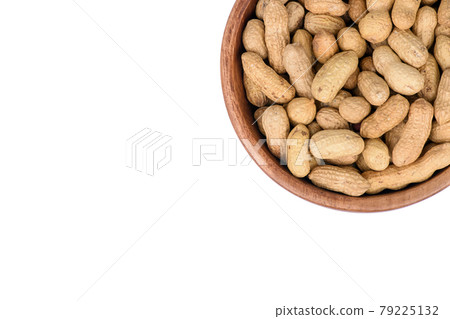 peanut in a shell texture. food background of peanuts peanut in a shell texture. food background of peanuts 79225132
