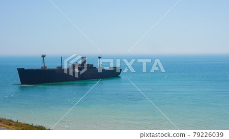 The wreck of an abandoned historic ship from 1942 abandoned on the sea. The wreck of an abandoned historic ship from 1942 abandoned on the sea. 79226039
