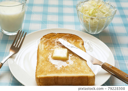 Breakfast bread. Toast with melted butter Breakfast bread. Toast with melted butter 79228308