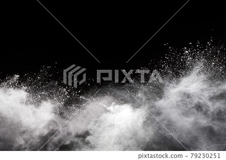 White powder explosion on black background. Colored cloud. Colorful dust explode. Paint Holi. 79230251