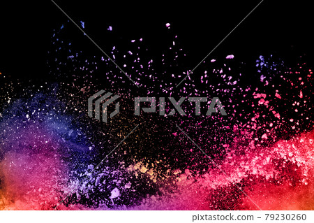 abstract colored dust explosion on a black background. abstract colored dust explosion on a black background. 79230260