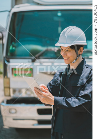 Truck driver and tablet 79230415