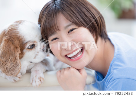 Portrait of dog and young woman Portrait of dog and young woman 79232488