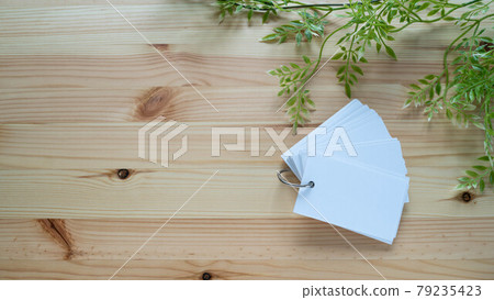 A blank notepad on the wood grain table. Vocabulary Book A blank notepad on the wood grain table. Vocabulary Book 79235423