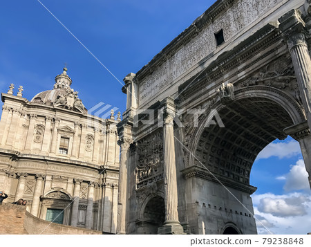 Forum Romanum in Rome, Italy. In a distance Colosseum. 79238848