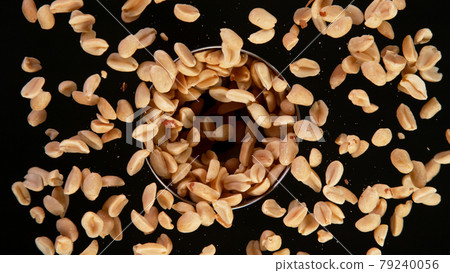 Rotating Peanuts on Black Background. Rotating Peanuts on Black Background. 79240056