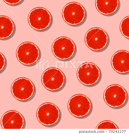 Seamless grapefruit with shadow pattern on pastel surface. Colorful fresh citrus slice pink pattern. Seamless grapefruit with shadow pattern on pastel surface. Colorful fresh citrus slice pink pattern. 79242277