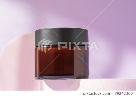 Organic face cream cosmetic mock up on podium, low angle view, copy space. Blank jar of luxury lotion in brown bottle standing on pedestal showcase. Beauty packaging mockup Organic face cream cosmetic mock up on podium, low angle view, copy space. Blank jar of luxury lotion in brown bottle standing on pedestal showcase. Beauty packaging mockup 79242360