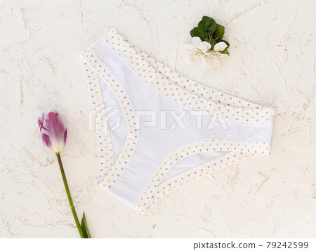 Beautiful women's cotton panties on white background. 79242599