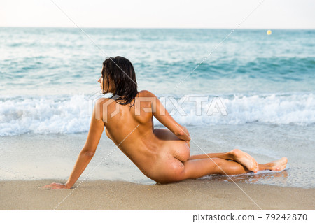 Naked woman lying in pose Naked woman lying in pose 79242870