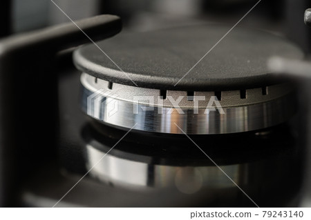 New modern shining metal gas cooker close up New modern shining metal gas cooker close up 79243140