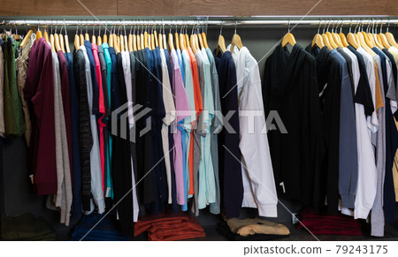 Different assortment of colorful clothing in boutique Different assortment of colorful clothing in boutique 79243175