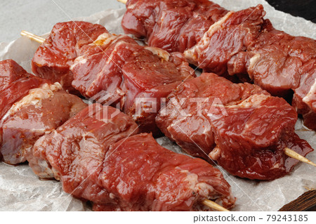 Raw beef kebab on skewers ready for barbecue Raw beef kebab on skewers ready for barbecue 79243185