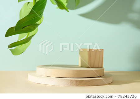 Minimal modern cosmetic products with natural cosmetics on neutral beige background with shadow overlay Minimal modern cosmetic products with natural cosmetics on neutral beige background with shadow overlay 79243726