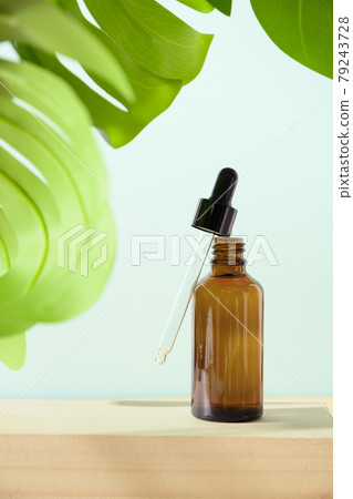 Minimal modern cosmetic products with natural cosmetics on neutral beige background with shadow overlay Minimal modern cosmetic products with natural cosmetics on neutral beige background with shadow overlay 79243728