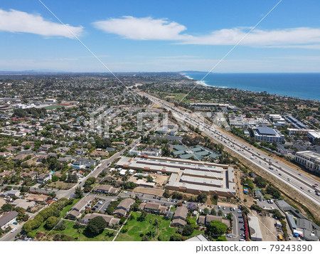 Aerial view of Encinitas with highway and ocean on the background in San Diego, California Aerial view of Encinitas with highway and ocean on the background in San Diego, California 79243890