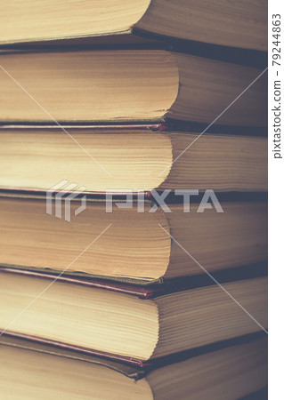 vertical stack of books background toned vertical stack of books background toned 79244863